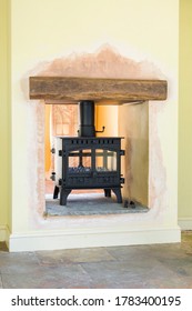 New wood burning stoves. Installing a double-sided wood burning stove, UK interior design