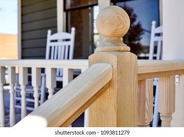 New Wood Hand Rail Being Installed On A Home Restoration Project