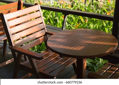 new wood table with chair and beautiful sunlight on  summer no body with copy space