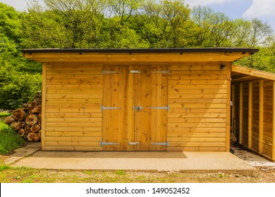 a new wooden shed in the countryside - Powered by Shutterstock