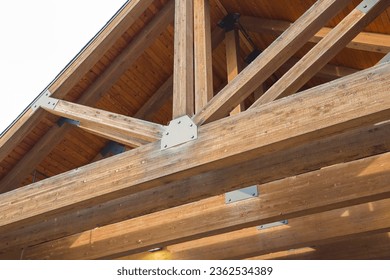 New wooden truss structure called palladian truss with beams and wooden roof 