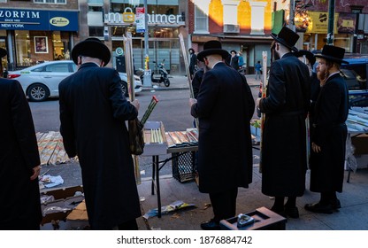NEW Y, UNITED STATES - Oct 01, 2020: Ultra-Orthodox Jews from the Williamsburg neighborhood of Brooklyn shop for lulavs and etrogs ahead of the Sukkot holiday 