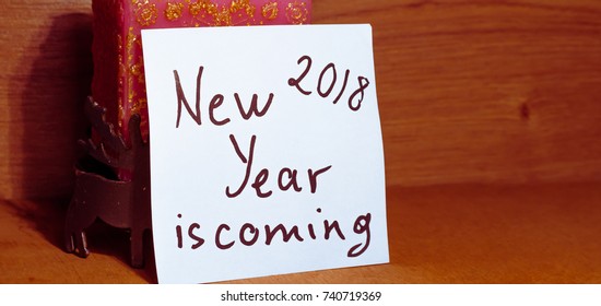 new year 2018 is coming inscription inscription on paper
