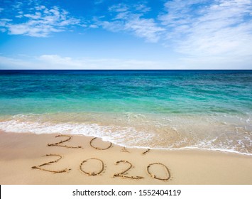 New Year 2020 is coming concept. Happy New Year 2020 replace 2019 concept on the sea beach - Powered by Shutterstock