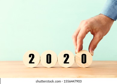 New Year 2020 Concept. Business Idea Over Wooden Board