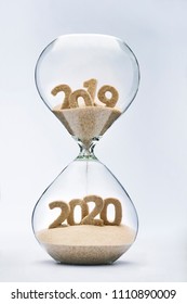 New Year 2020 Concept With Hourglass Falling Sand Taking The Shape Of A 2020