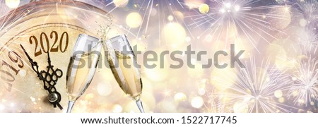 New Year 2020 - Countdown And Toast With Champagne And Clock

