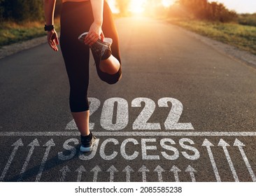 New year 2022 concept. Girl waiting to start the new year 2022 with success. Planning,opportunity, challenge and business strategy.  New goal, plans and visions for the next year 2022. - Shutterstock ID 2085585238