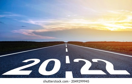New Year 2022 inscription on the road, journey dawn beautiful landscape