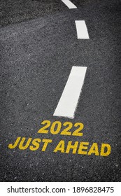 New Year 2022 And Just Ahead Word On Road Surface, Business Challenge Concept And Keep Moving Idea