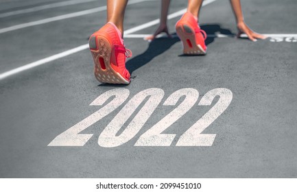 New Year 2022 ready set go fitness getting in shape woman runner at start line for goal achievement weight loss challenge banner. - Shutterstock ID 2099451010