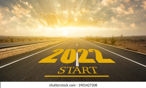 New Year 2022 Or Start Concept.Word 202 Written On The Road In Asphalt Road At Sunrise. New Life Change 2022 Plan Concept