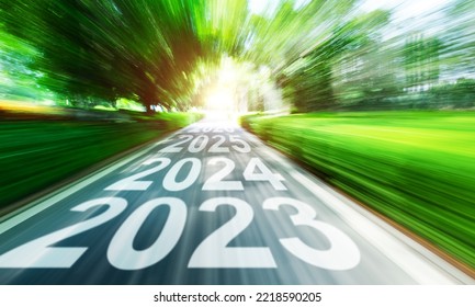 New year 2023 to 2026 written on highway with blurred motion - Shutterstock ID 2218590205