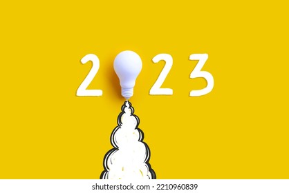 New year 2023 Ideas,inspiration concepts with rocket light bulb on yellow background.Business start up or goal to success.creativity of human - Shutterstock ID 2210960839