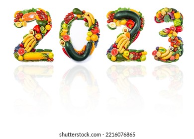 New Year 2023 made of vegetables, fruits and fish on white background. New years 2023 healthy food. New year 2023 food trends. 2023 resolutions, trends, healthy eating, sustainable, goals concept