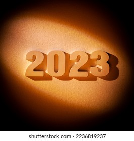 New Year 2023 - Number in bright spot of light - Shutterstock ID 2236819237
