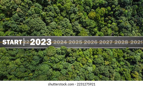 new year 2023 numbers on road drag tires Planning concept, goals, challenges, environment in 2023, bird's eye view. - Shutterstock ID 2231275921
