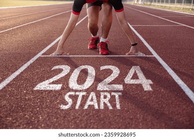 New year 2024 concept. Young man ready to run preparing for 2024 goals, Start new project.