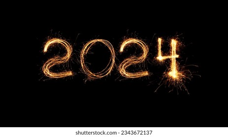 New Year 2024 light. Sparklers draw figures 2024. Bengal lights and letter. Holidays. Luxury 