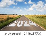 New Year 2024 upcoming, new beginnings, hope and opportunities reflecting the aspirations and dreams - Concept with road in a rural scene.