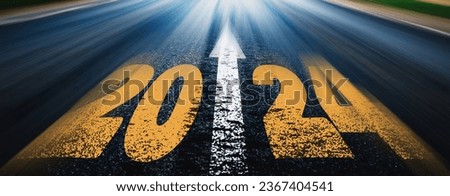 New year 2024 written on highway with blurred motion. Banner advertisement.future,work start run line vision concept.landscape road happy new year celebration.Beginning of 2024 for successful start.