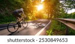 New year 2025 or start straight and beginning concept. Man ride on bike and the number 2025 start written on the road at sunset with lens flare. Concept of challenge or career path, business strategy.