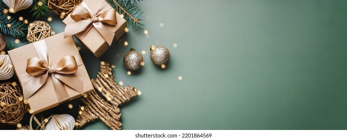 New Year banner with Christmas gift boxes and golden decorations on khaki background. - Shutterstock ID 2201864569
