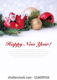 New Year Card. Christmas Decorations, Red And Gold Balls, Candle Holder Santa Claus.