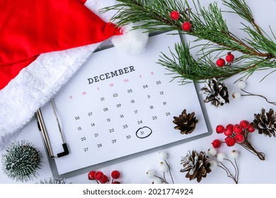 New Year And Christmas Decorations Flat Lay. Top View. Calendar December Month. Planning Holidays. New Year Party. 31 Of December In Calendar