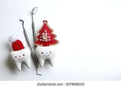 New Year. Christmas. dentist tools Dentistry.Dentist. Dentist. 2023 santa hat on tooth figurine - Shutterstock ID 2074048319