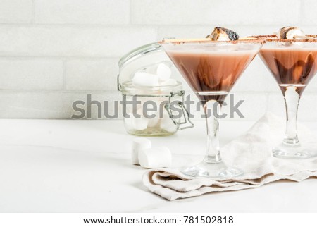 New Year and Christmas drinks idea, Toasted smores martini, white background, copy space