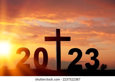 New Year concept and 2023 numbers and cross - Shutterstock ID 2237522387