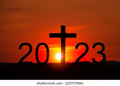 New Year concept and 2023 numbers and cross - Shutterstock ID 2237579061