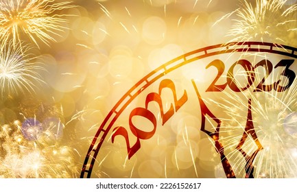 New Year concept, clock near to the midnight of 2023, fireworks golden bokeh background - Shutterstock ID 2226152617