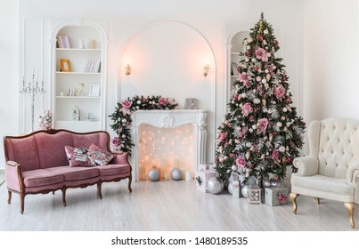 New Year Decorated Interior - Bright Room With Christmas Decoration - Fir-tree, Retro Sofa, Gift Boxes, Fireplace Decorated With Garlands - Hoilday Celebration Photo