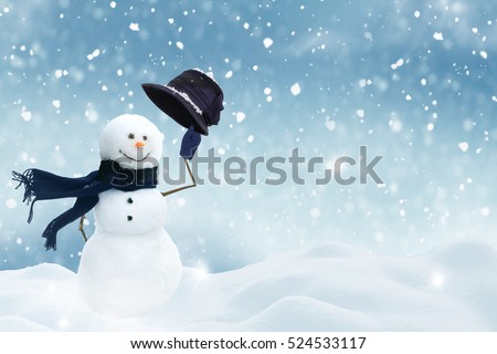 New year greeting card with copy-space.Happy snowman standing in christmas landscape.Snow background