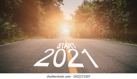 New year ideas 2021 New beginning planning for a better future Better life than last year, move forward and experience success in life. The road with the movie Start 2021 and the sun shining brightly