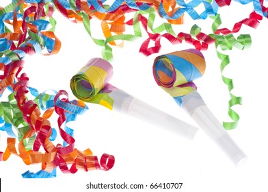 New Year Party Concept With Streamers And Noise Makers On White.