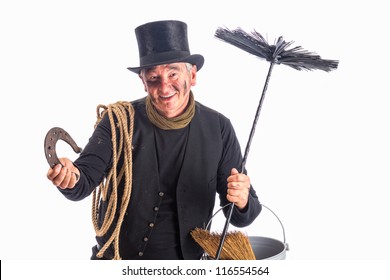 New Year photo of a chimney sweep wishing good fortune with a horseshoe
