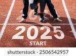 New year resolution 2025 concept. Word start 2025 written on athletics track and athlete woman runner preparing for new year for challenge and change. planning health and the goal to success