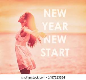 New Year Resolution Woman Feeling Free For 2020 Weight Loss Freedom Happy Girl With Open Arms On Beach Sunset. Text Writing NEW YEAR NEW START For Achieving Life Goals.