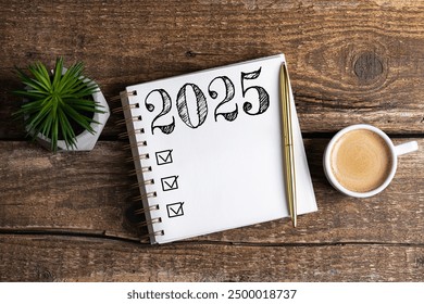 New year resolutions 2025 on desk. 2025 goals list with notebook, coffee cup, plant on wooden table. Resolutions, plan, goals, action, checklist, idea concept. New Year 2025 resolutions, copy space - Powered by Shutterstock