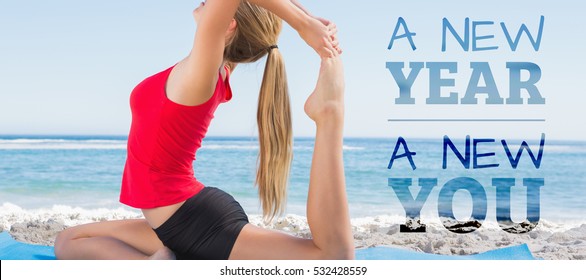 New Year New You Against Fit Blonde Stretching Leg In Yoga Pose