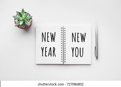 New Year New You Text On Notepad With Office Accessories.Business Motivation,inspiration Concepts