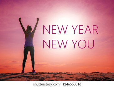 New Year New You Text Quote On The Image Of Womans Silhouette At Sunrise.