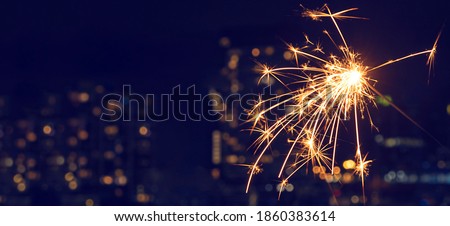 New Year's 2025 celebration sparkler at night