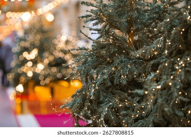 New Year's card 2026. Festive garlands and lights on the Christmas tree. Close-up. Beautiful Christmas background. The concept of decorations and decorations for the new year. - Powered by Shutterstock - Get 15% off with code: PIKWIZARD15