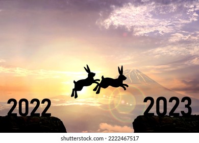 New Year's card-Silhouette of a jumping rabbit, Mt. Fuji and the first sunrise of the year