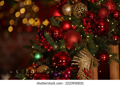 New Year's decor, Christmas decoration at home. Decorated fir-tree with colorful balls, decorative garlands, lights, golden balls. Holiday ornament. Ornamental Christmas balls, Christmas macro photo - Shutterstock ID 2223950031