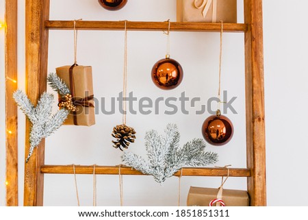 New Year's decor. New Year cards. tree made of wooden sticks. Christmas decorations